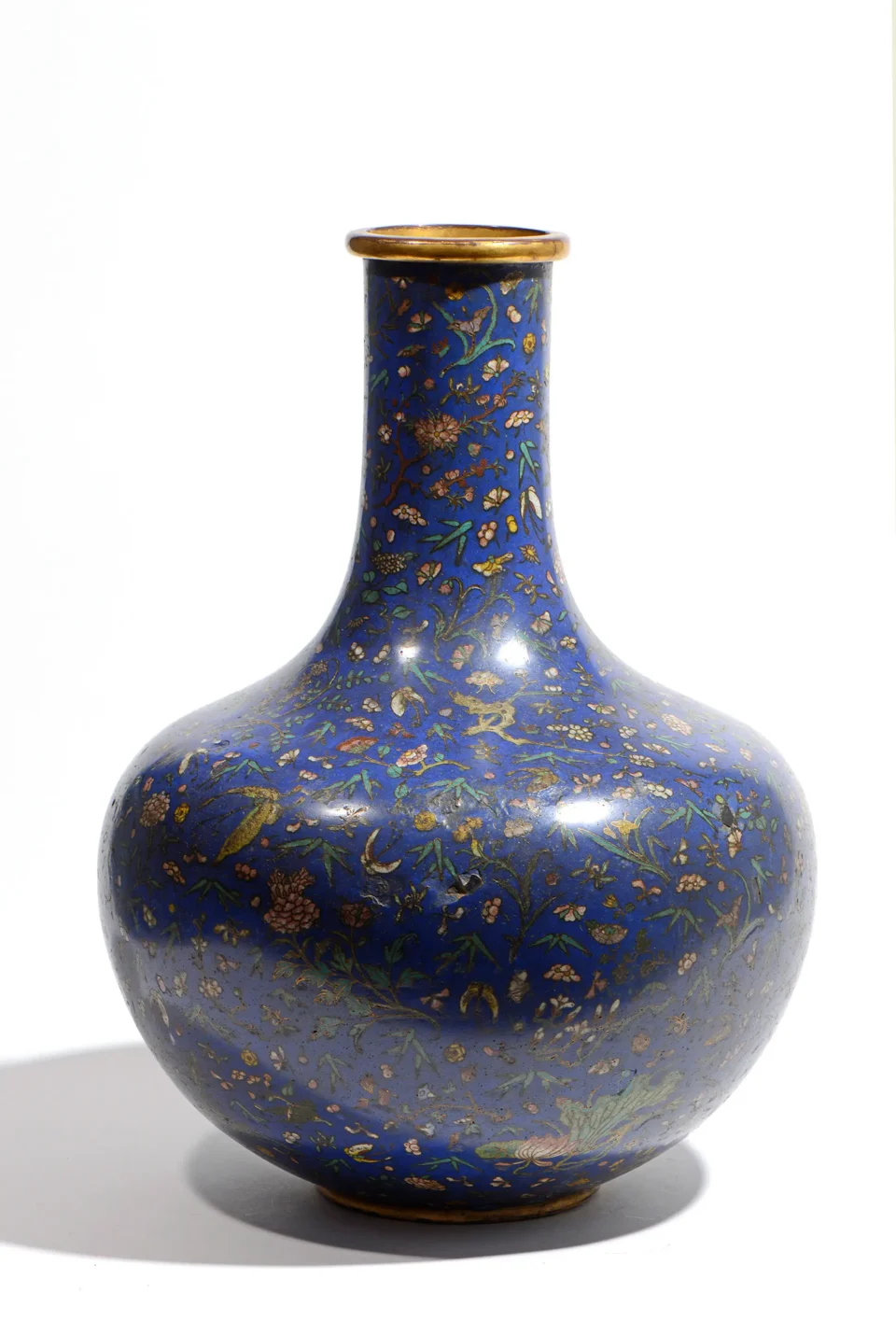 Large tianqiuping bottle vase in gilt bronze and polychrome enamel on a midnight-blue background, decorated with butterflies, peony flowers, cherry trees and bamboo. - CHINA - 19th century